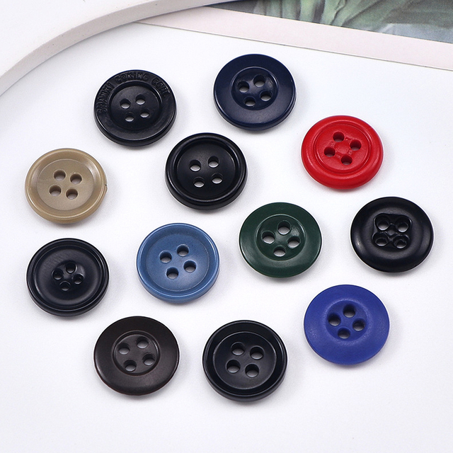 Bottoni in urea ecologici ignifughi durevoli a 4 fori da 15 mm per indumenti e pantaloni